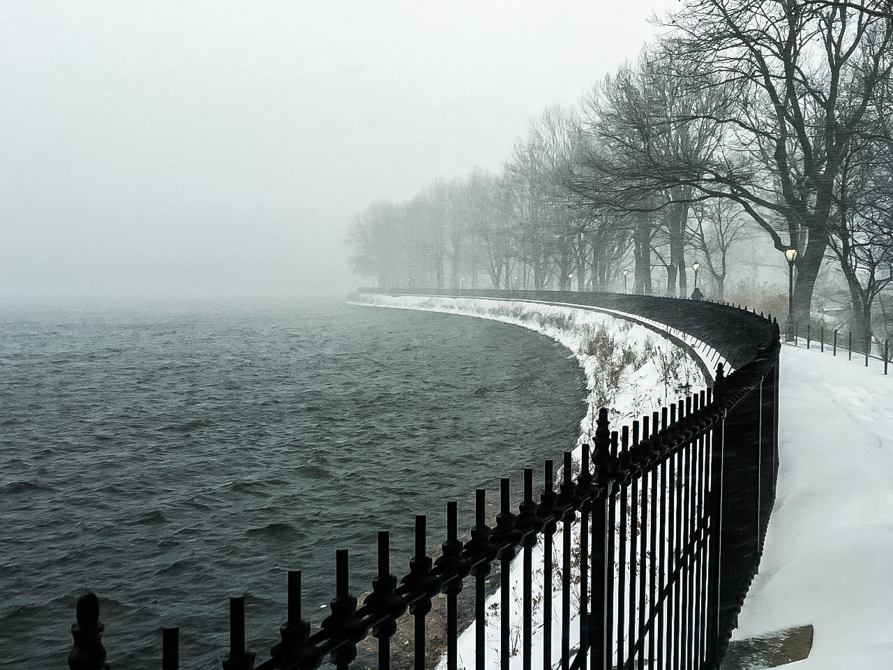 Experience a Solitary Reservoir Walk on a Stormy Day in New York City. Walking into the fog, it feels like the end of the world instead of the middle of Gotham.