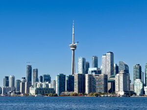 Airplance Perched on CN Tower SkyPod as viewed from the Toronto Islands
