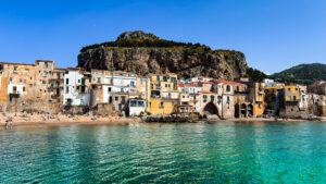 Cefalù beach and old town below La Rocca, the cliff that offers panoramic views over Sicily’s northern coast.